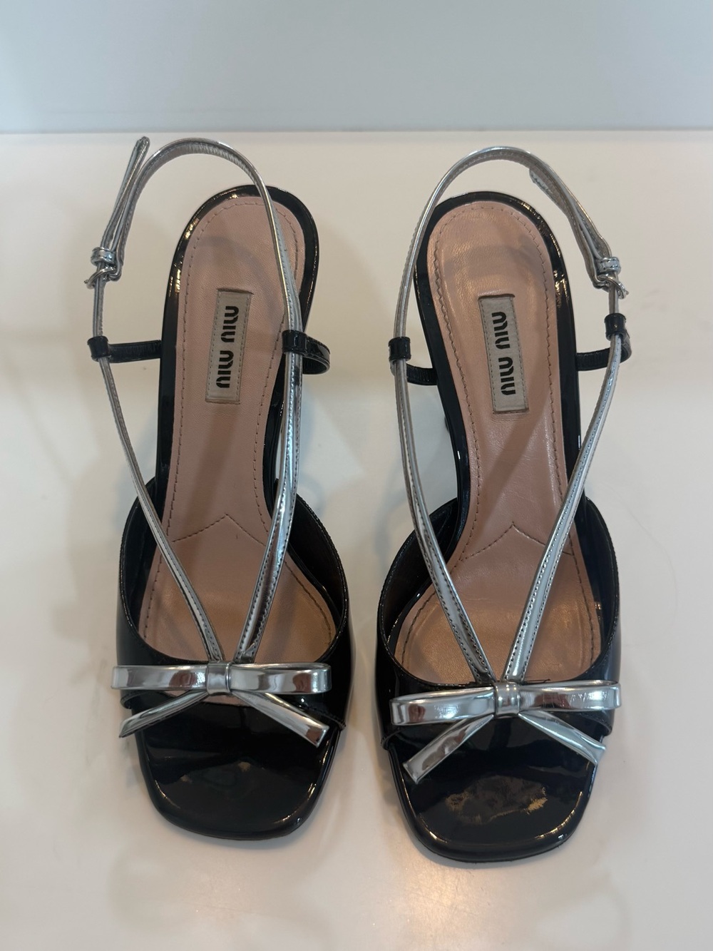 Miu Miu Black Patent Slingback Sandals with Silver Bow Detail